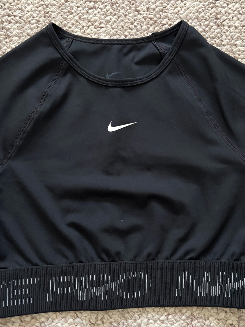Nike Black Short-Sleeve crop athletics top.